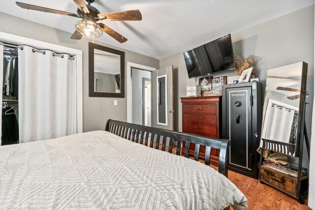 bedroom featuring ceiling fan and hardwood / wood-style floors