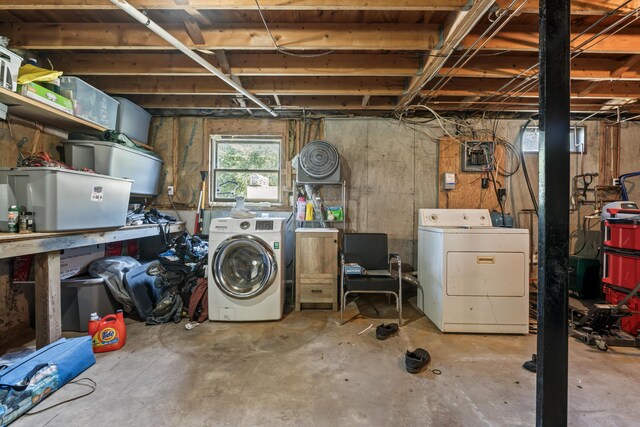 basement with washing machine and clothes dryer