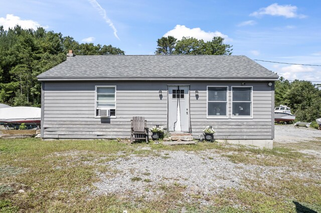 back of property with cooling unit