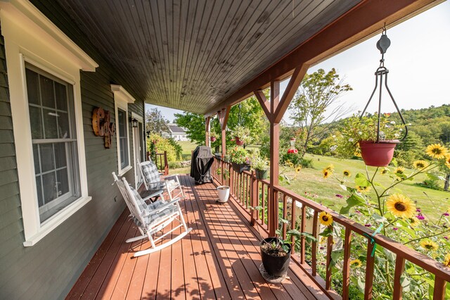 deck with covered porch