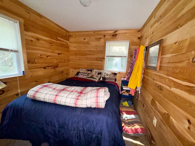 bedroom featuring multiple windows