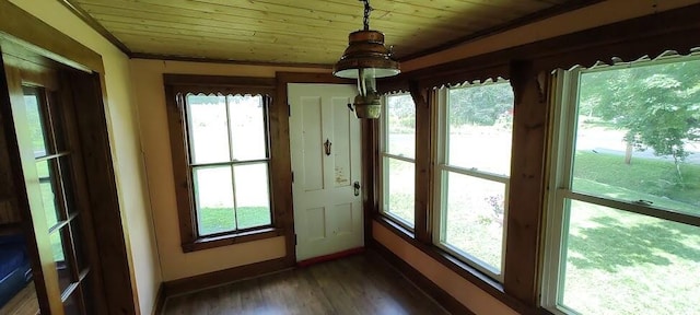 unfurnished sunroom featuring wood ceiling