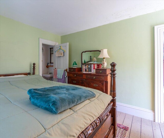 bedroom with light hardwood / wood-style flooring