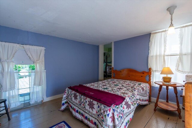 bedroom with wood-type flooring