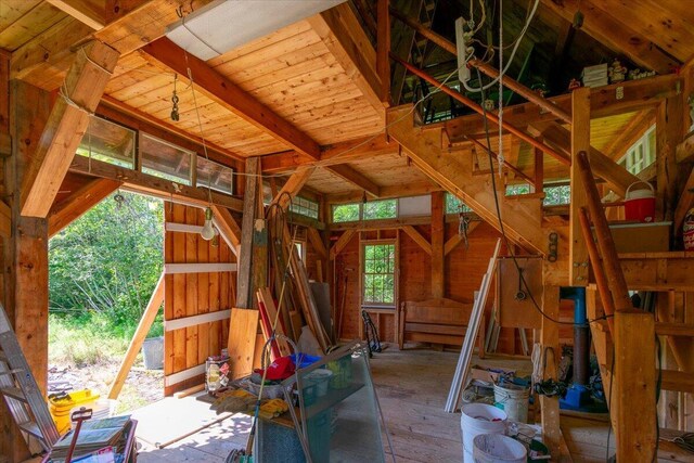 interior space with plenty of natural light and wooden walls