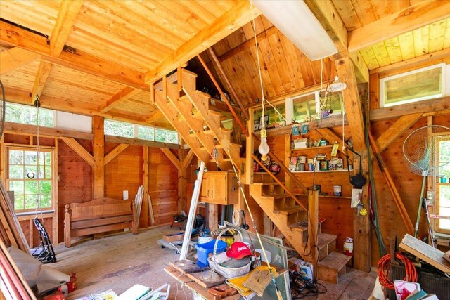 miscellaneous room with wood ceiling and vaulted ceiling