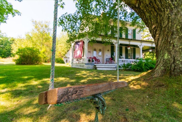 292300 Main Rd, Islesboro, ME 04848 - view of front of home featuring covered porch and a front yard