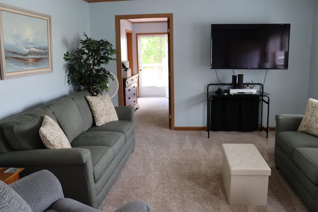 living room featuring light carpet