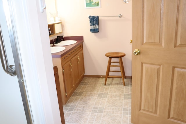 bathroom featuring vanity and tile patterned floors