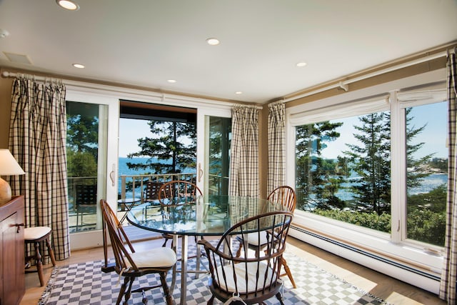 41 Sandpiper Ln, Bristol, ME 04539 - dining area featuring recessed lighting, a baseboard heating unit, and a wealth of natural light