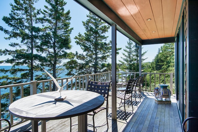 41 Sandpiper Ln, Bristol, ME 04539 - wooden deck featuring outdoor dining area