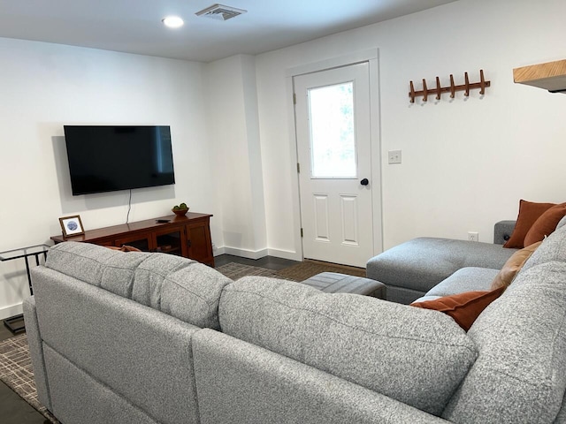 living room featuring dark hardwood / wood-style flooring