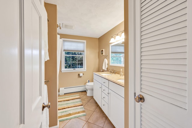 bathroom featuring tile patterned flooring, a baseboard radiator, toilet, and vanity