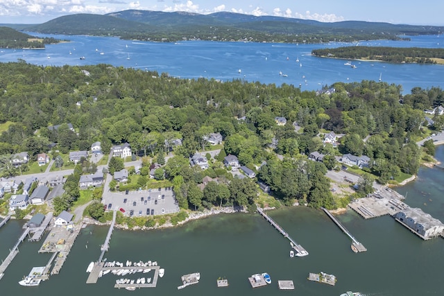 aerial view featuring a water and mountain view