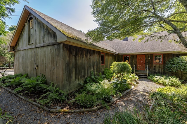 view of front of property with a shingled roof