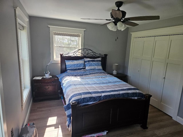 bedroom featuring a closet, ceiling fan, and hardwood / wood-style floors