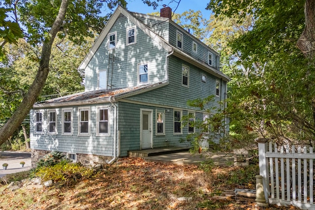 rear view of property with a patio