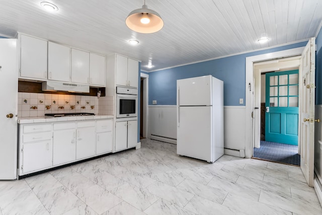 kitchen with white cabinets, tasteful backsplash, white appliances, a baseboard heating unit, and crown molding