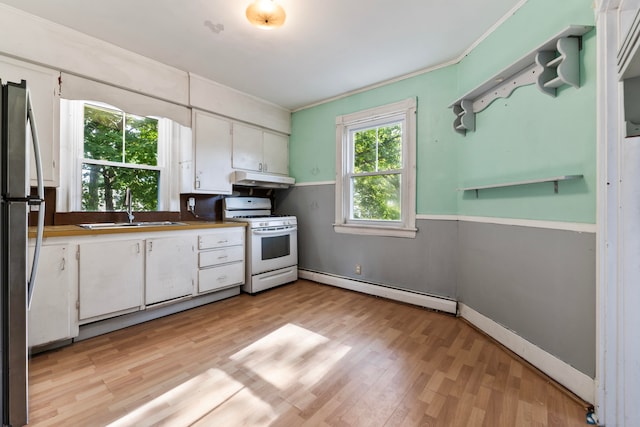 kitchen with a baseboard heating unit, light wood-type flooring, sink, white cabinetry, and white gas range