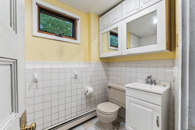 bathroom featuring tile walls, tile patterned flooring, vanity, and toilet