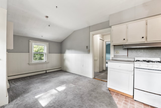 kitchen featuring tasteful backsplash, white cabinets, baseboard heating, lofted ceiling, and white range with gas cooktop