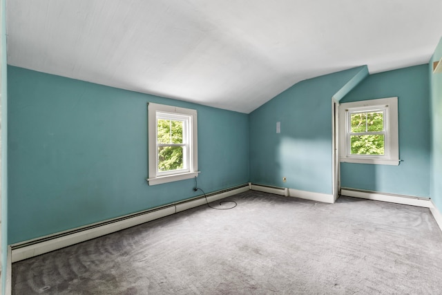 bonus room featuring carpet floors, lofted ceiling, and plenty of natural light