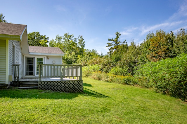 view of yard featuring a deck