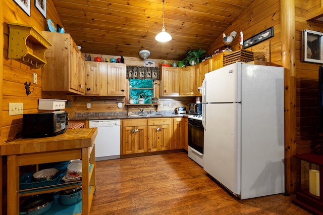 kitchen with decorative light fixtures, hardwood / wood-style floors, sink, wood ceiling, and white appliances