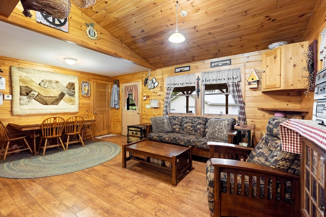 living room with wood walls, wooden ceiling, light wood-type flooring, and lofted ceiling