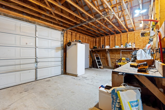 garage featuring a workshop area