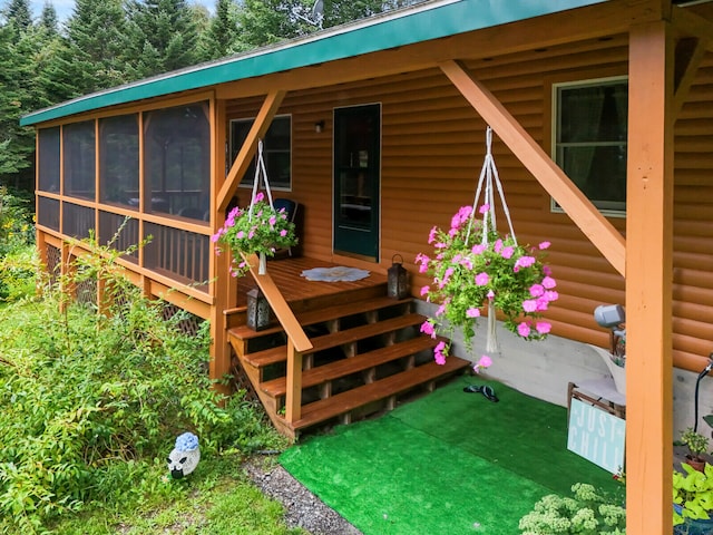 exterior space featuring a sunroom