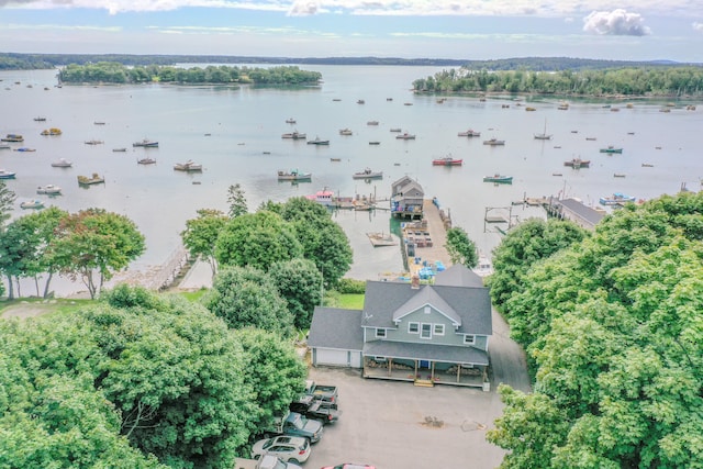 drone / aerial view with a water view