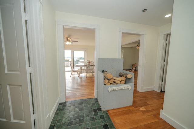 hall with dark hardwood / wood-style floors