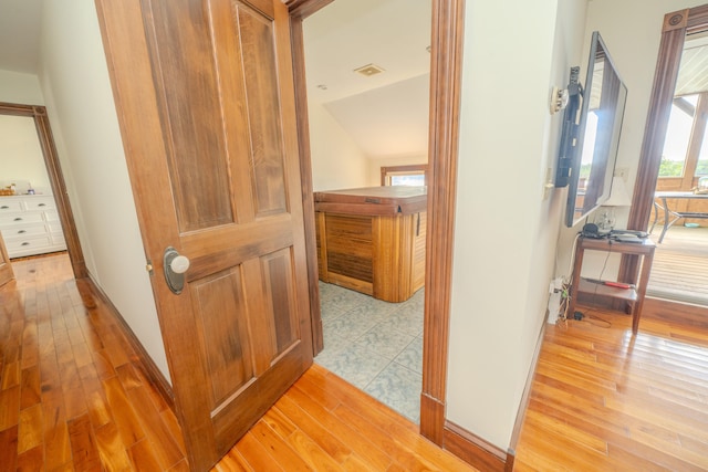 hall featuring light hardwood / wood-style floors