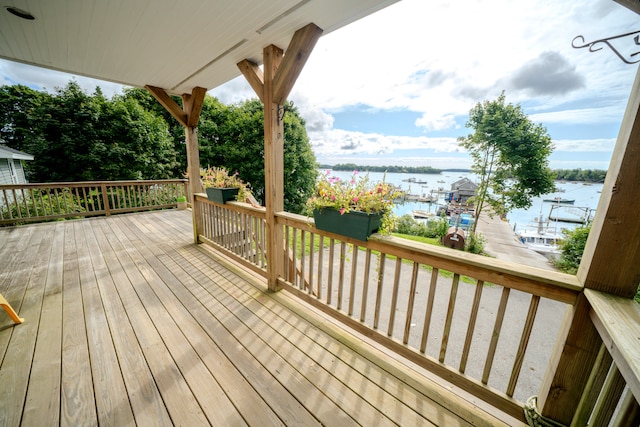 deck featuring a water view