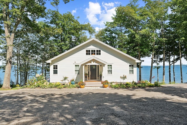 bungalow-style home featuring a water view