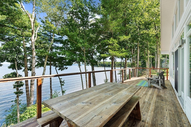 deck featuring a water view