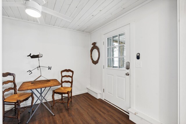 foyer entrance with ceiling fan, wooden ceiling, and dark hardwood / wood-style flooring