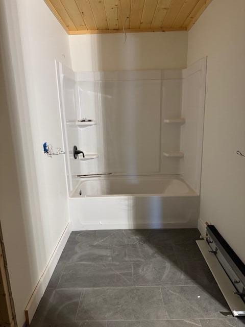 bathroom featuring wood ceiling and shower / bath combination