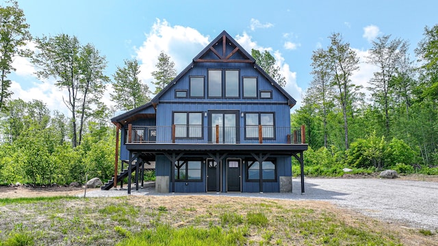 48 Harmony Row, Bethel, ME 04217 - view of front of home featuring stairway and a wooden deck