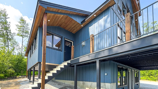 48 Harmony Row, Bethel, ME 04217 - view of property exterior featuring stairs and board and batten siding