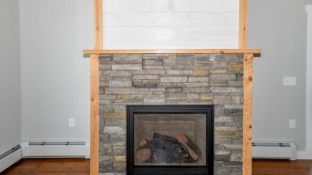 48 Harmony Row, Bethel, ME 04217 - detailed view of baseboard heating, a fireplace, and wood finished floors