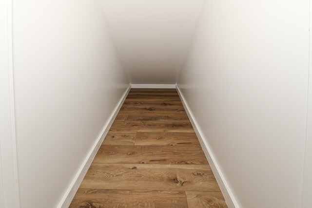 48 Harmony Row, Bethel, ME 04217 - staircase with wood finished floors and baseboards