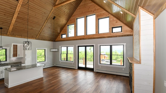 48 Harmony Row, Bethel, ME 04217 - unfurnished living room featuring a baseboard radiator, wooden ceiling, high vaulted ceiling, dark wood-style flooring, and plenty of natural light