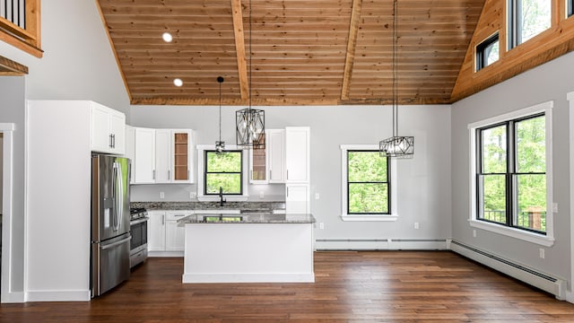 48 Harmony Row, Bethel, ME 04217 - kitchen featuring appliances with stainless steel finishes, high vaulted ceiling, a baseboard radiator, wooden ceiling, and a baseboard heating unit