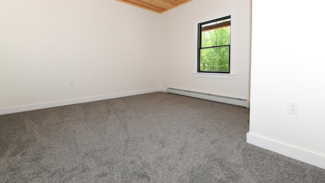 48 Harmony Row, Bethel, ME 04217 - spare room featuring a baseboard heating unit, dark colored carpet, and wooden ceiling