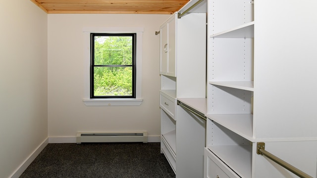 48 Harmony Row, Bethel, ME 04217 - spacious closet featuring a baseboard radiator and dark colored carpet