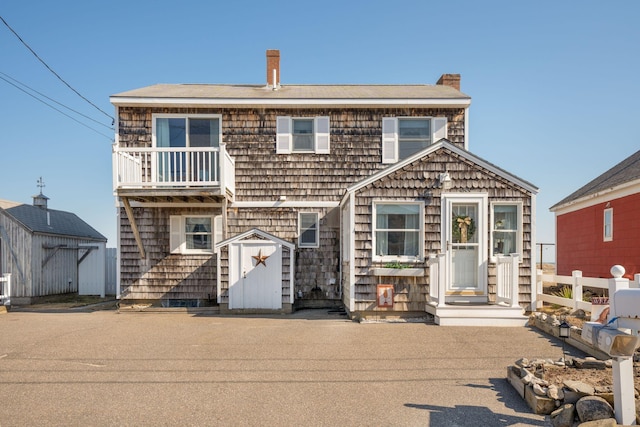 front of property with a balcony