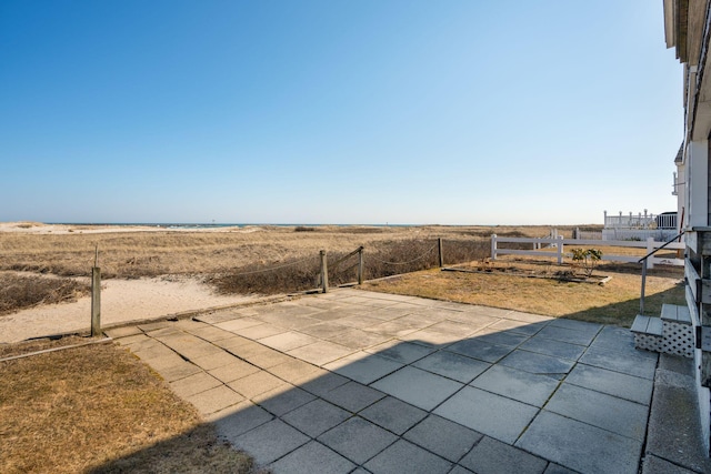 view of patio with a rural view