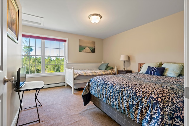 carpeted bedroom with a baseboard radiator